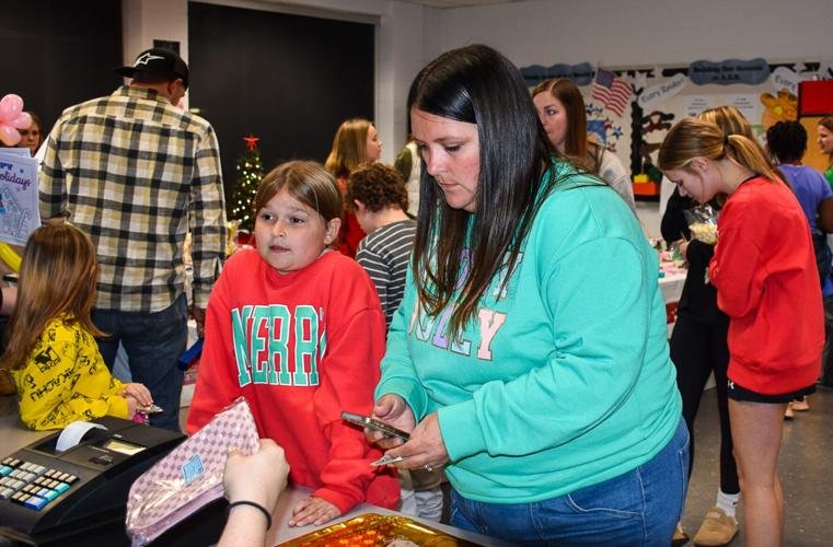 Cookies with Santa event at Appomattox Elementary School raises memorial scholarship funds
