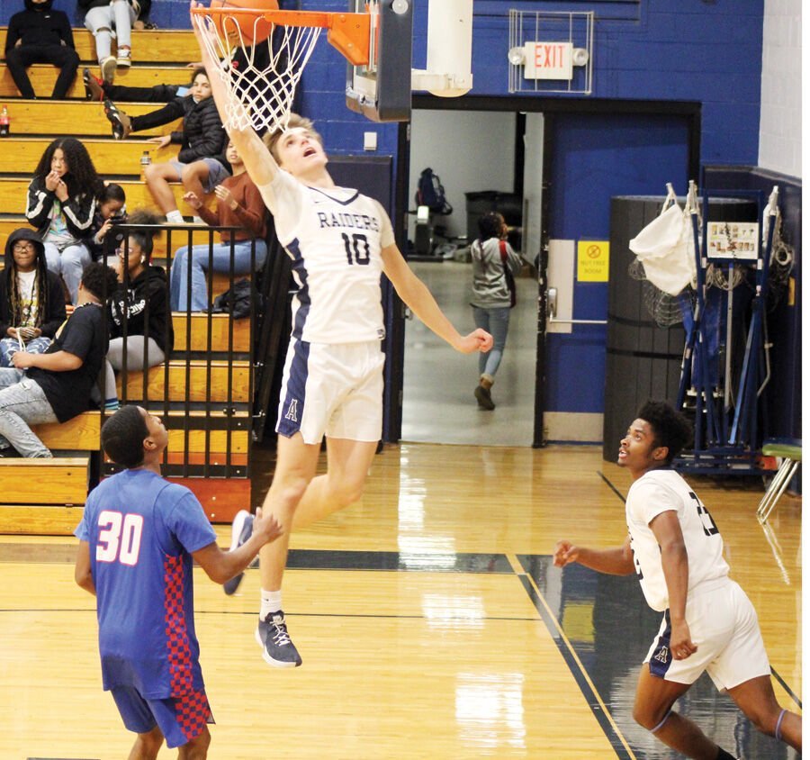 Raider boys basketball nets first win of season