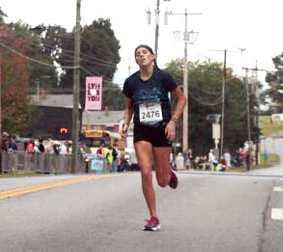 Madison Martin wins age group in Virginia 4+ Miler