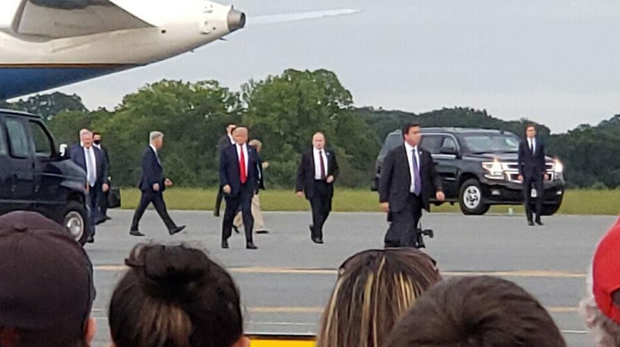 Multiple shots ring out at Trump rally, Trump seen injured, video shows