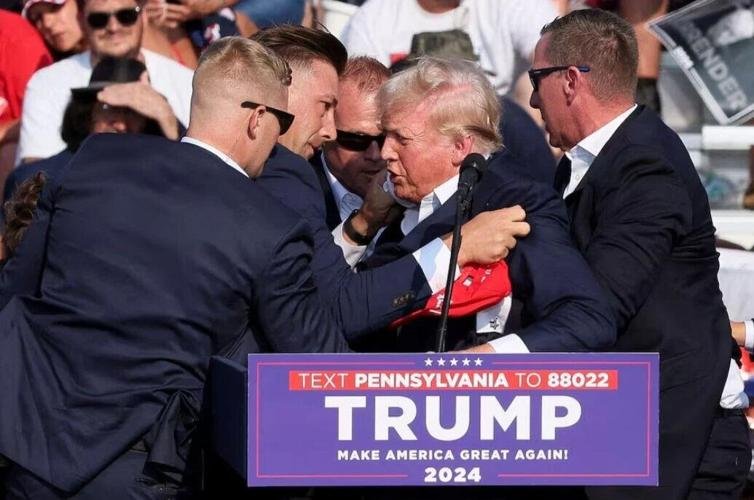Multiple shots ring out at Trump rally, Trump seen injured, video sho